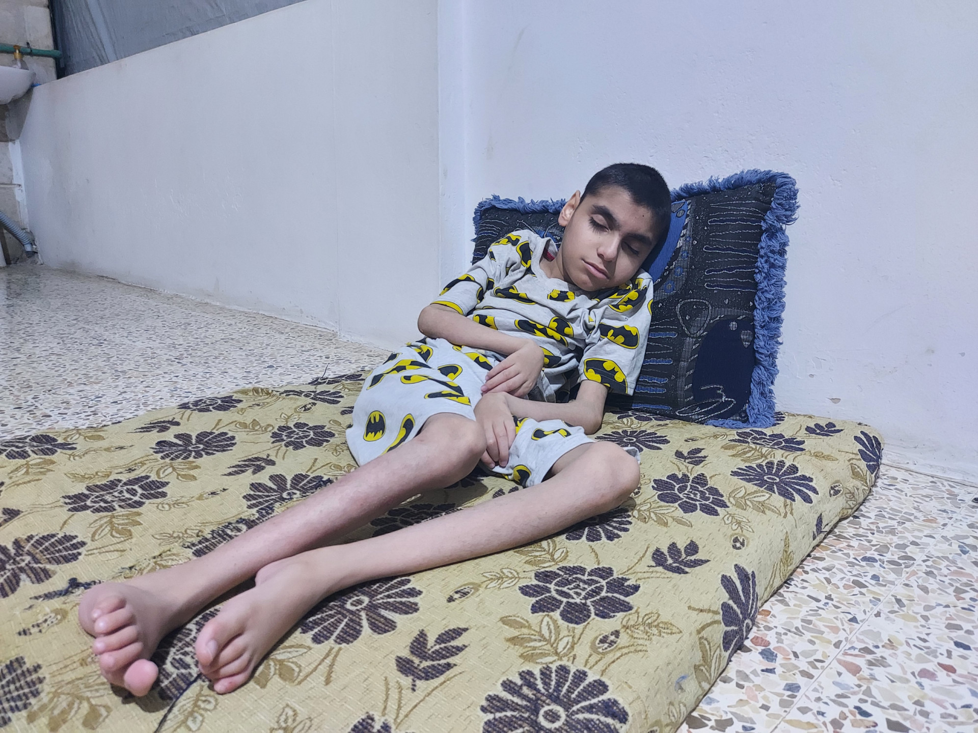 Mohammad is a child facing disability amid life's challenges.