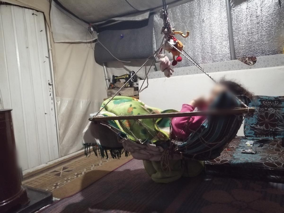 Living in an inadequate shelter with four children
