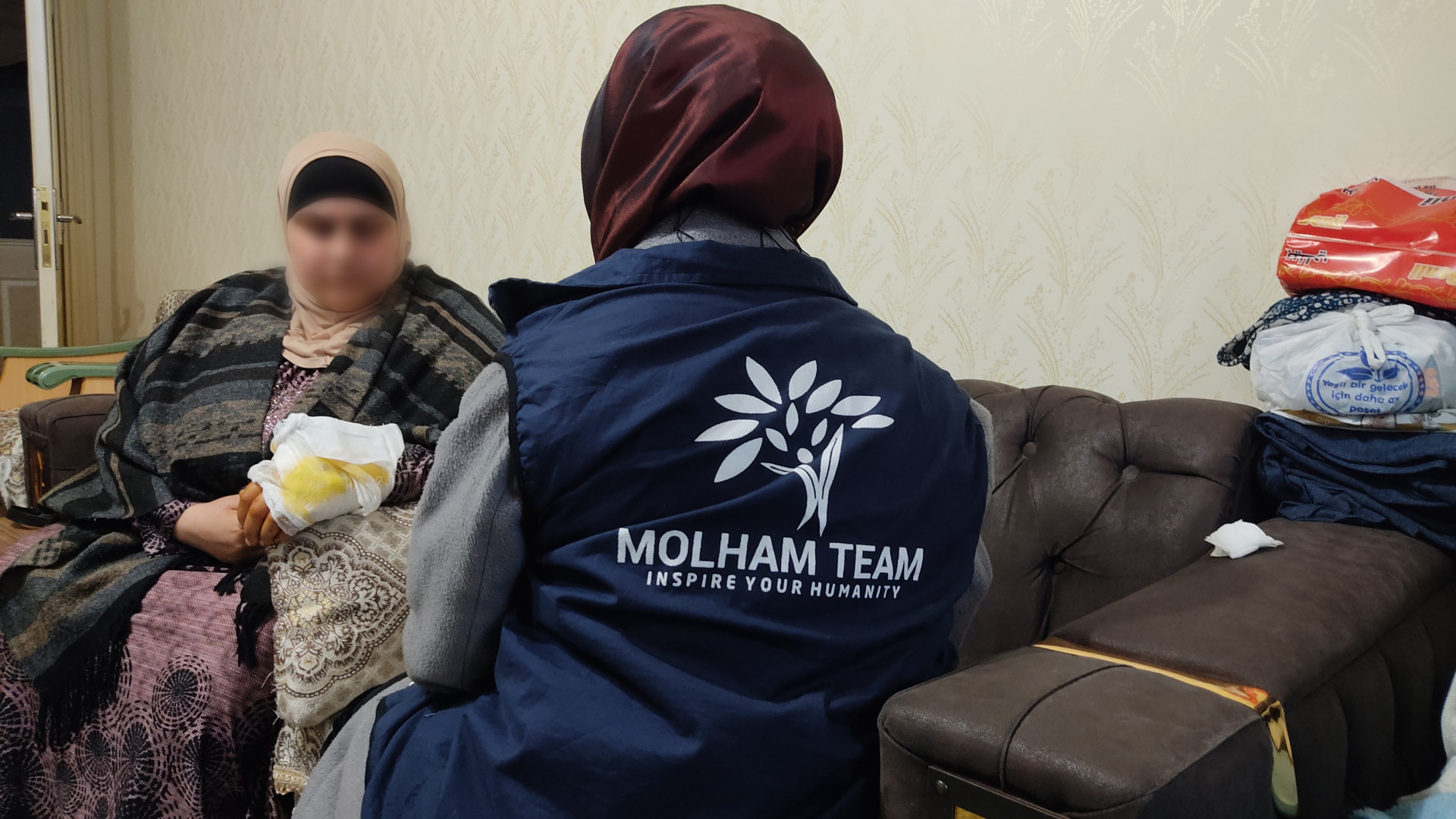 Israa lost her child in the earthquake and she is seriously injured
