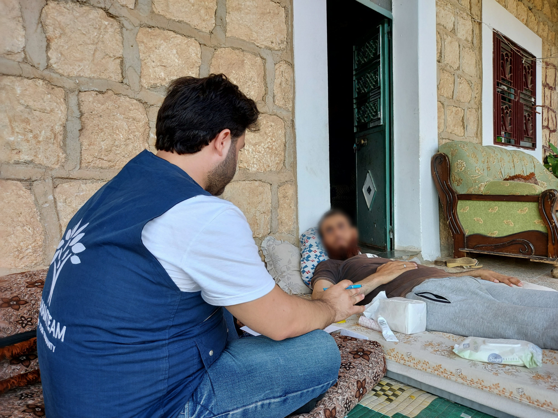 An injured young man needs medical essentials