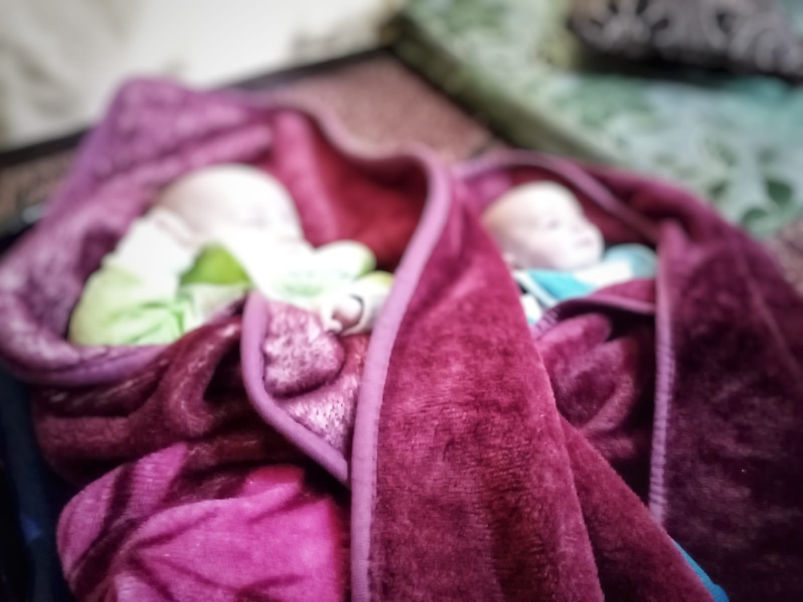 A twin is in need of babymilk and diaprse.