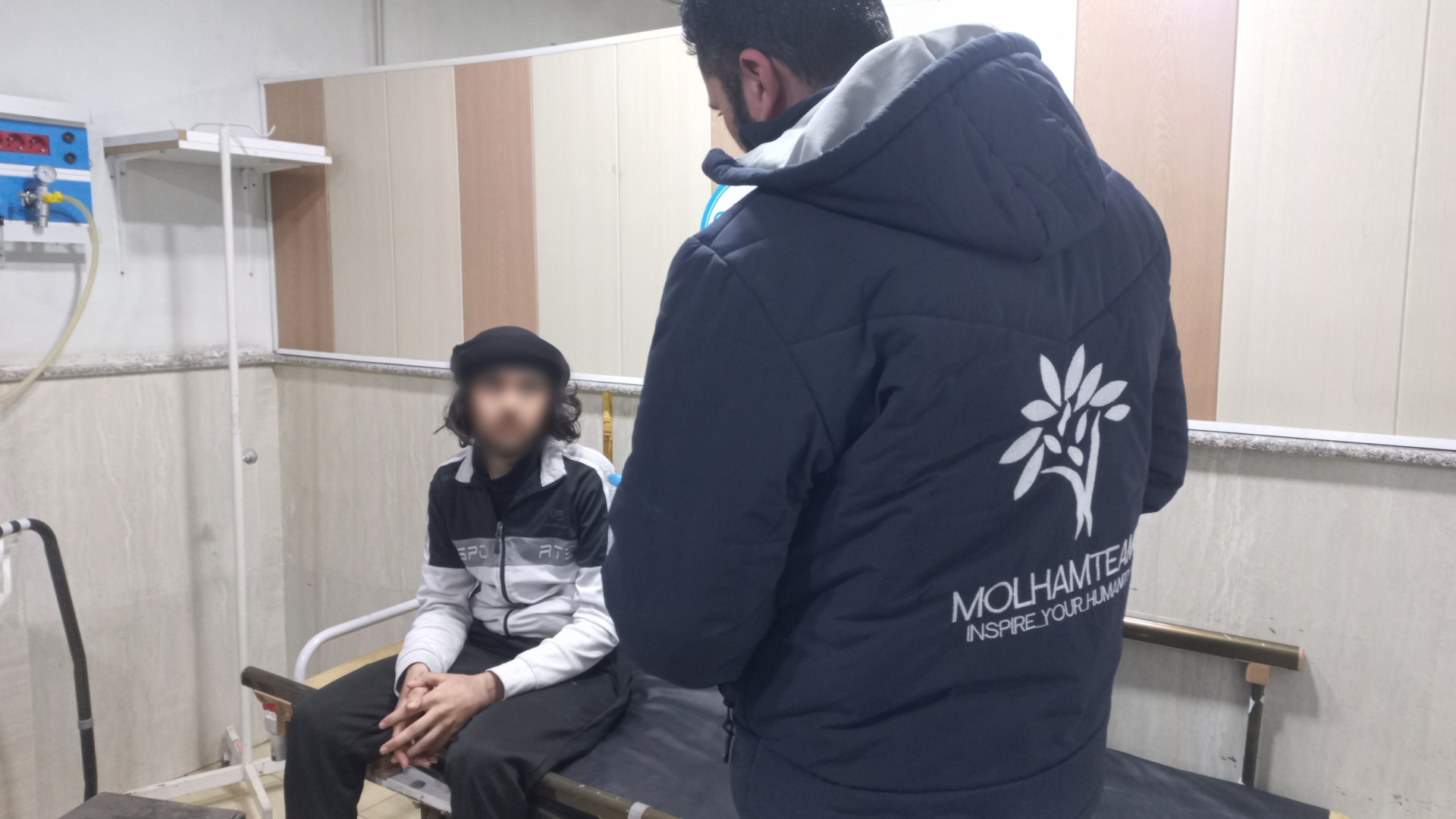 Illness and poverty surround the child Ahmed.