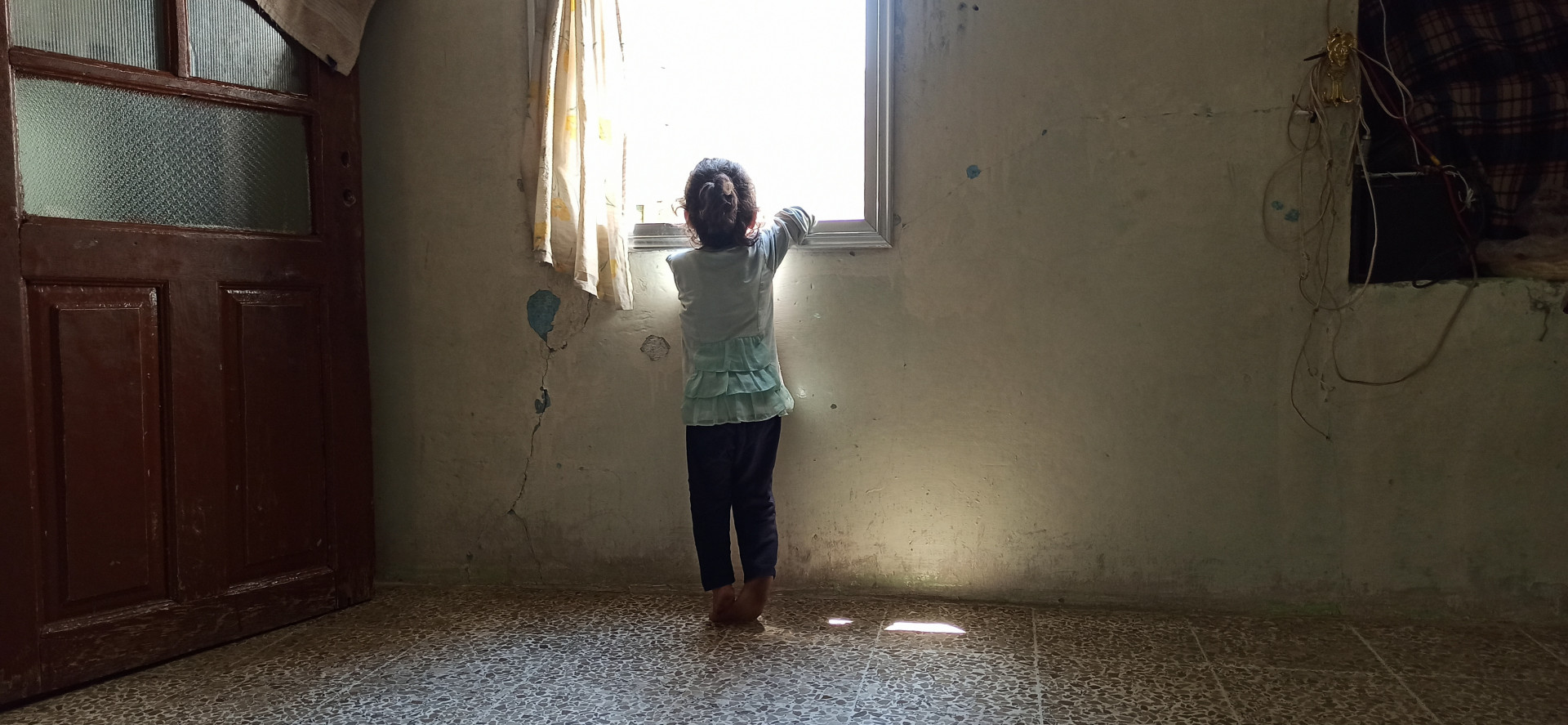 A family lives in dire conditions since they were displaced from Ma`arat al-Nu`man