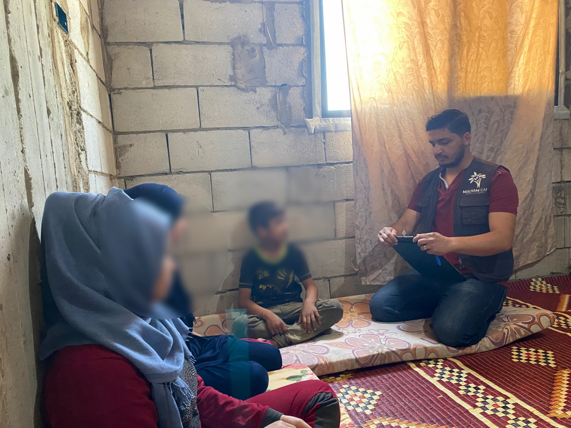 Her children go hungry in a partially built house