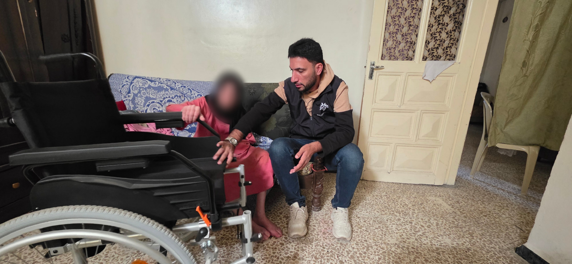 A prisoner within her own home, confined by paralysis.