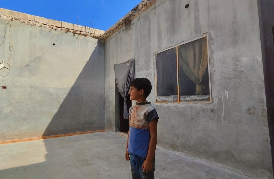 A family exhausted by displacement and the loss of a home.