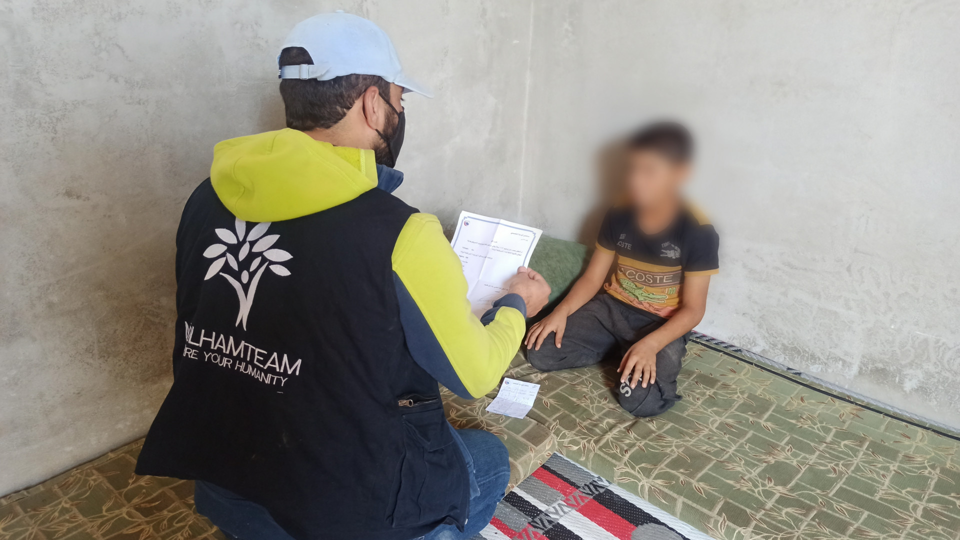 A displaced child suffers from growth deficiency lives with his blind father and cannot afford treatment costs.