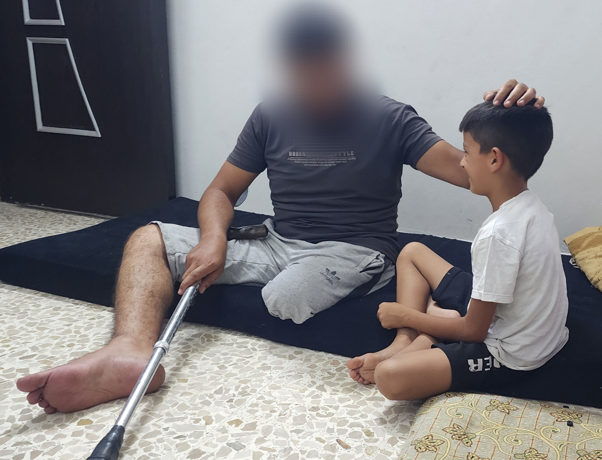The earthquake has left him with no one from his family except his little child , and he needs your help