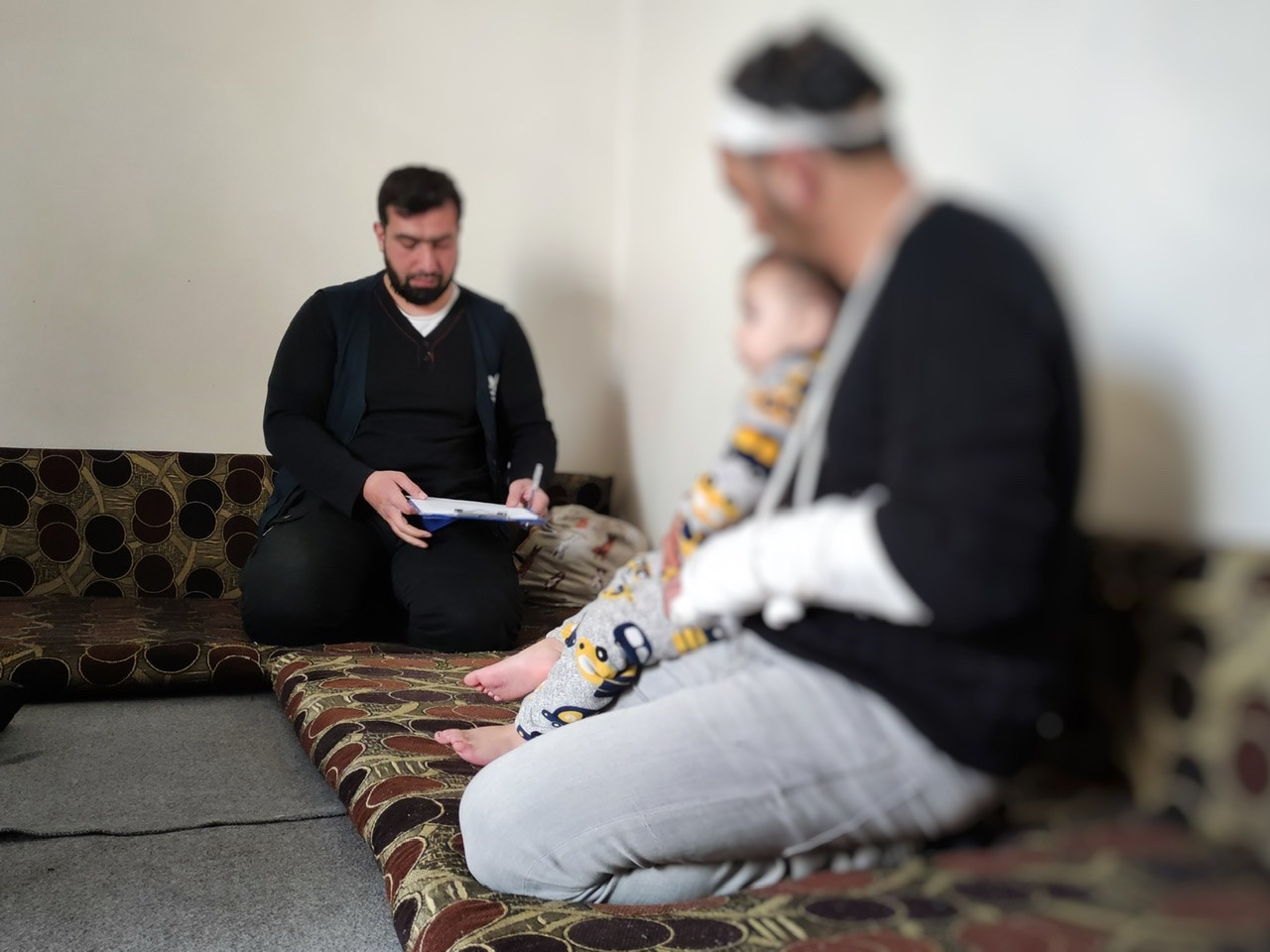 A displaced family with an injured breadwinner