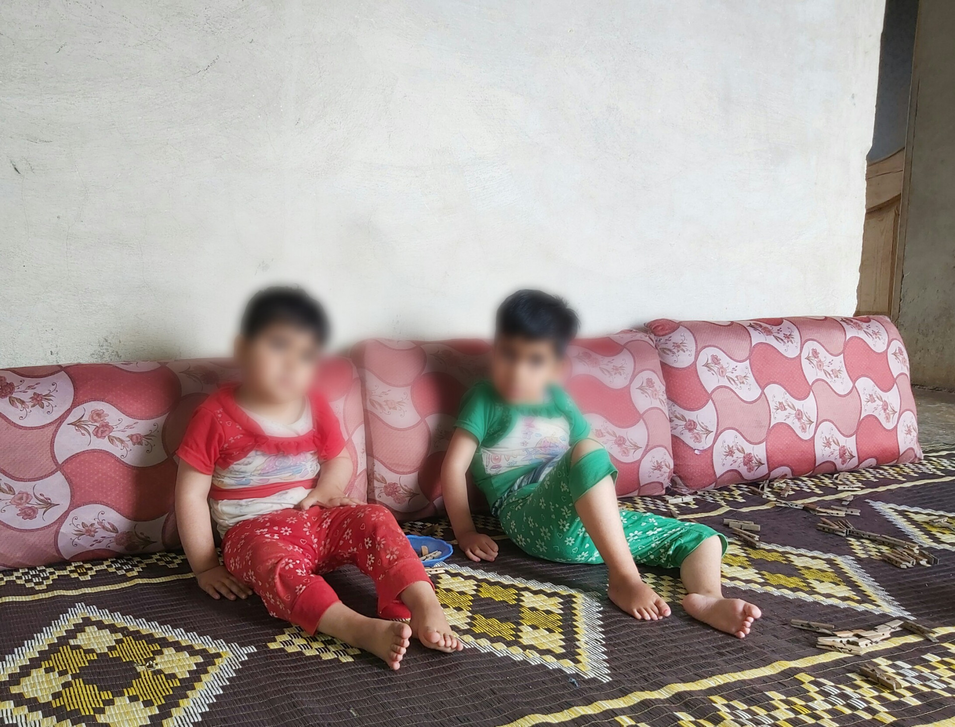 A man is a bedridden with two sick daughters