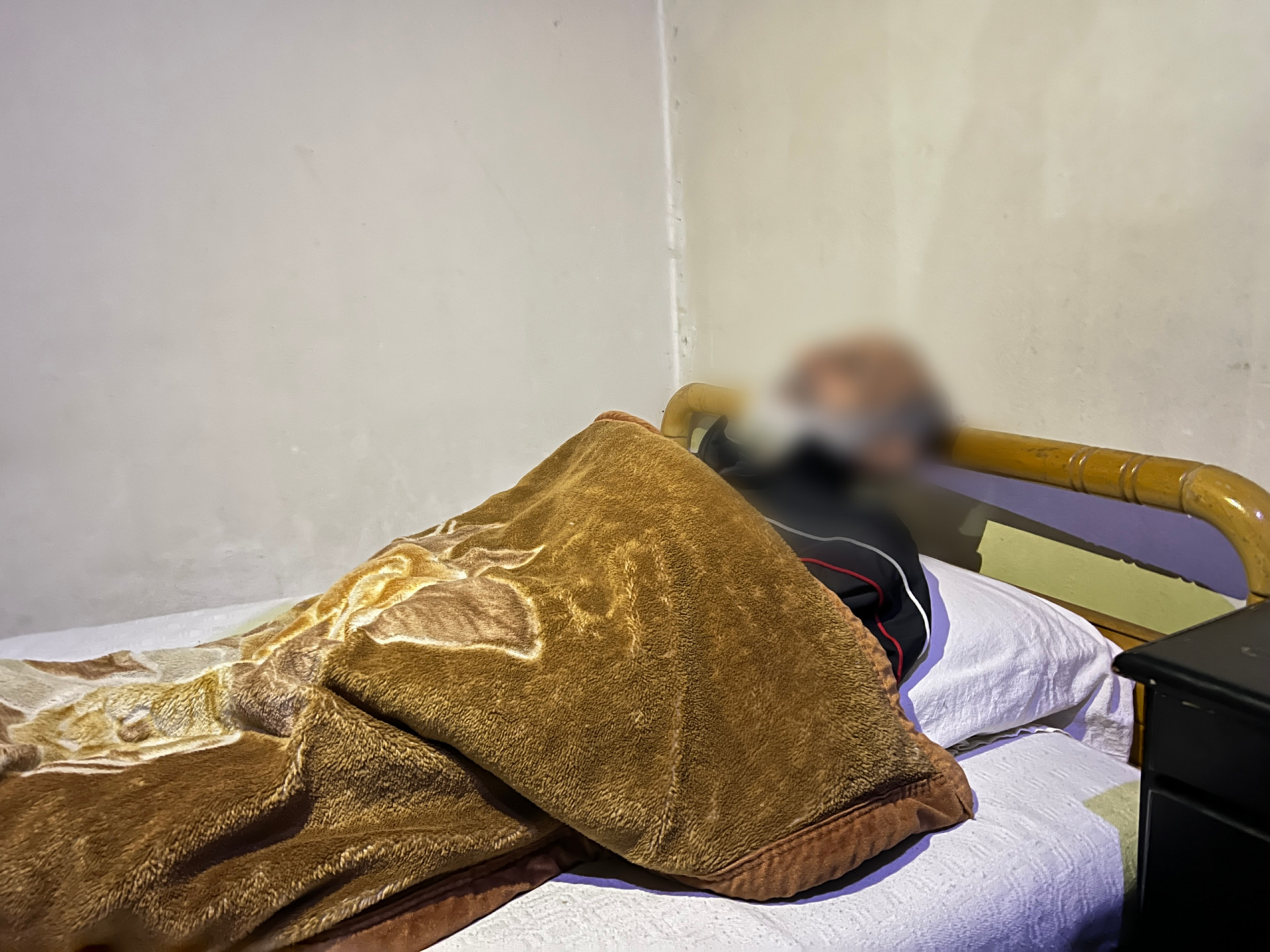 An elderly man with poor health