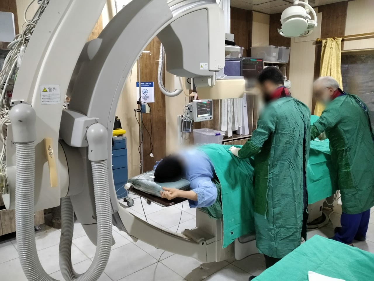A widow urgently needs cardiac catheterization