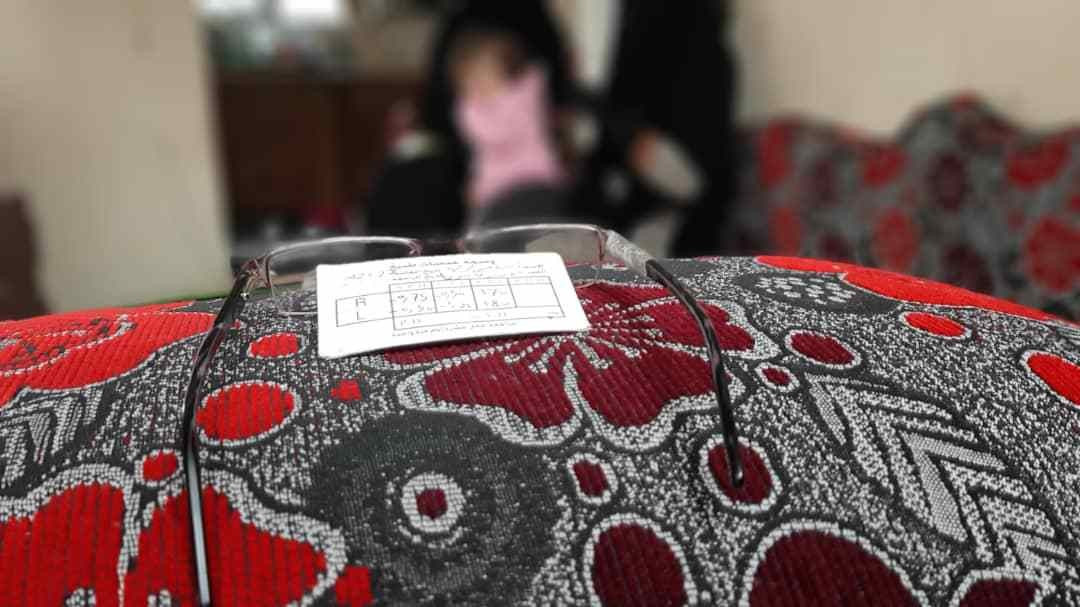 A widow (who has three children) suffers from visual impairment