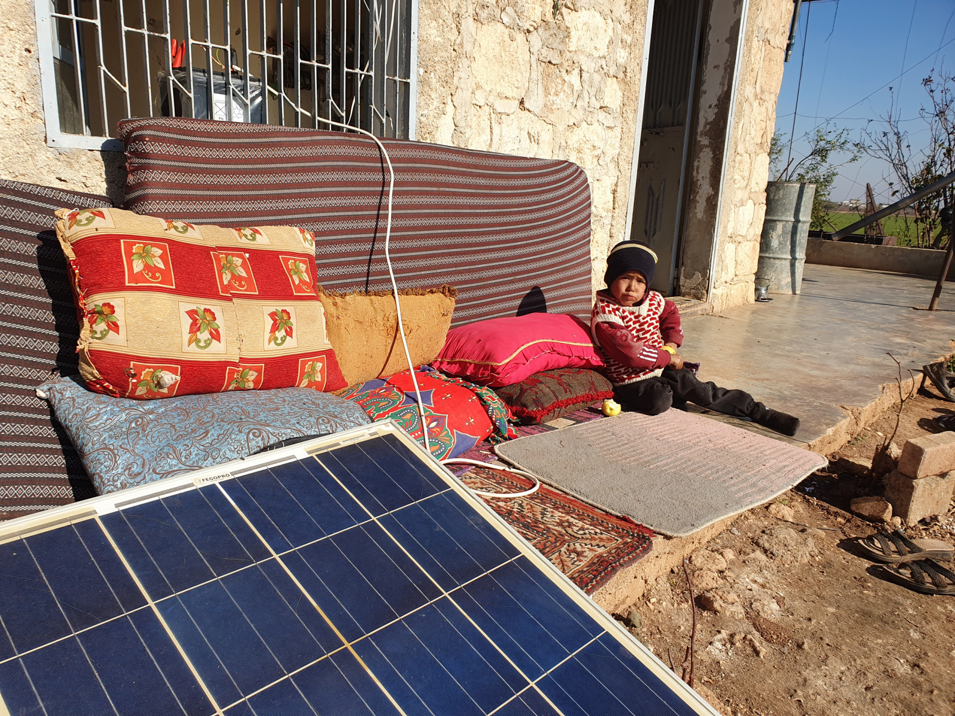 A family who fled war and settled in a room that lacks basic live needs
