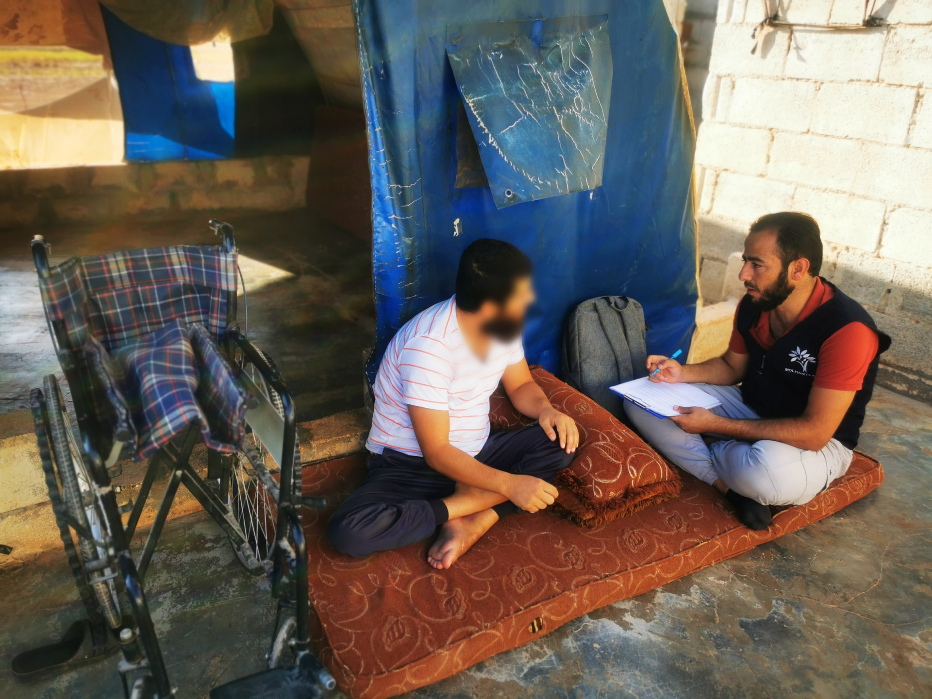 He was injured by an airstrike and needs wheelchair.