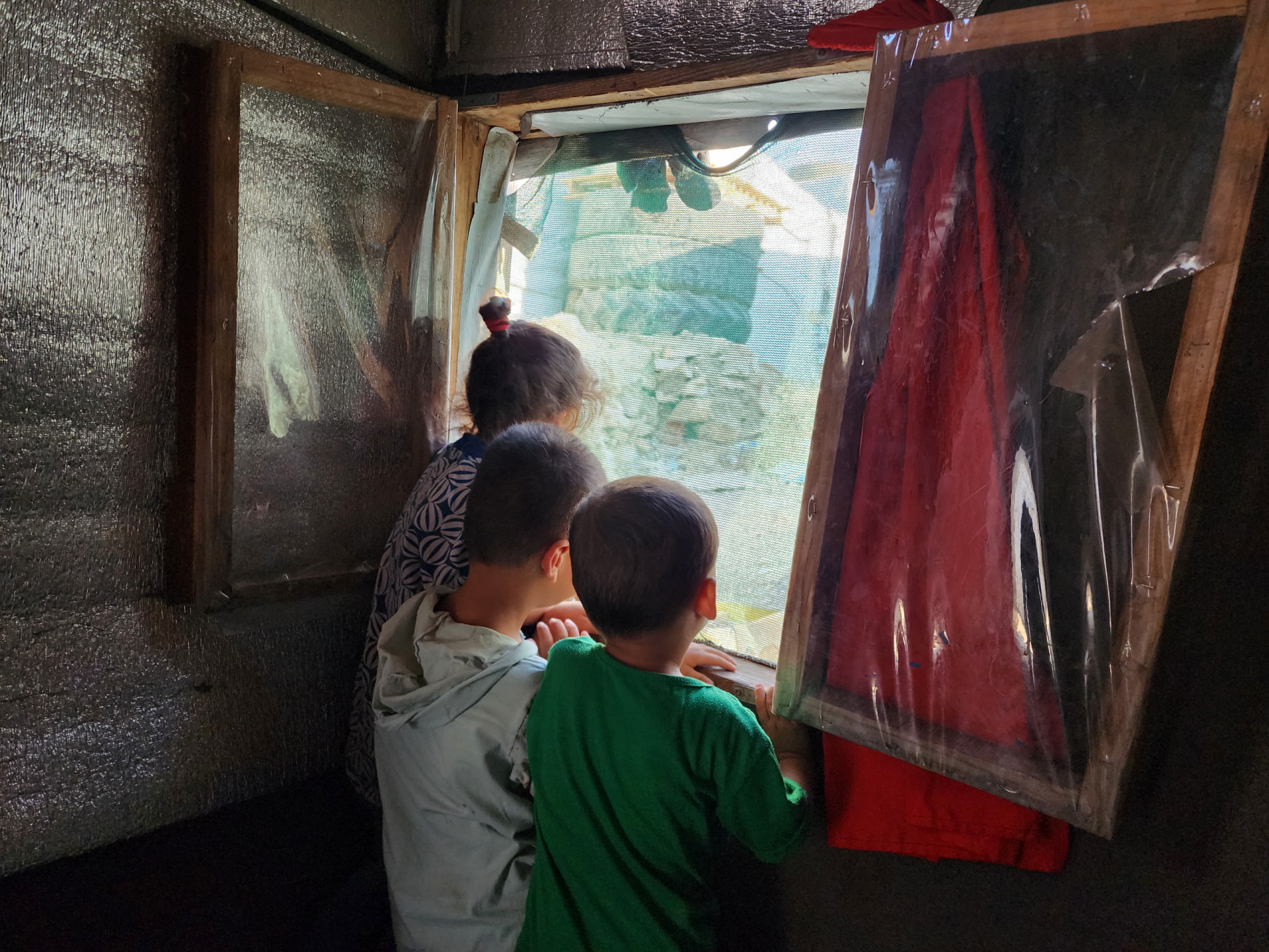 A tent, kids, and a loaf of bread