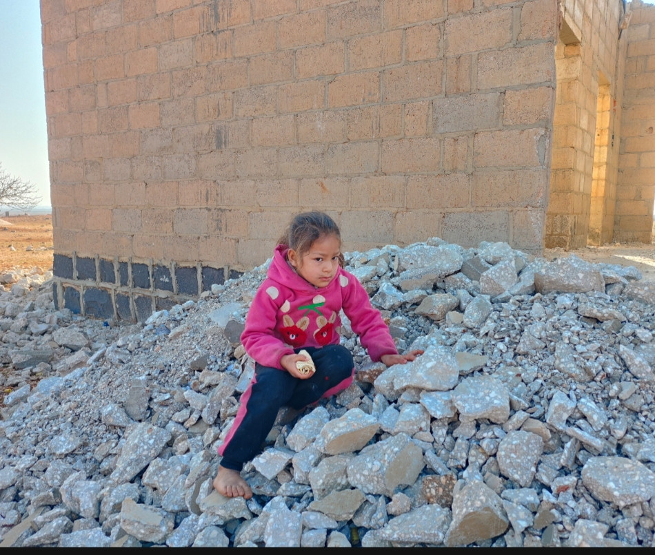 A father whose back is burdened with worry