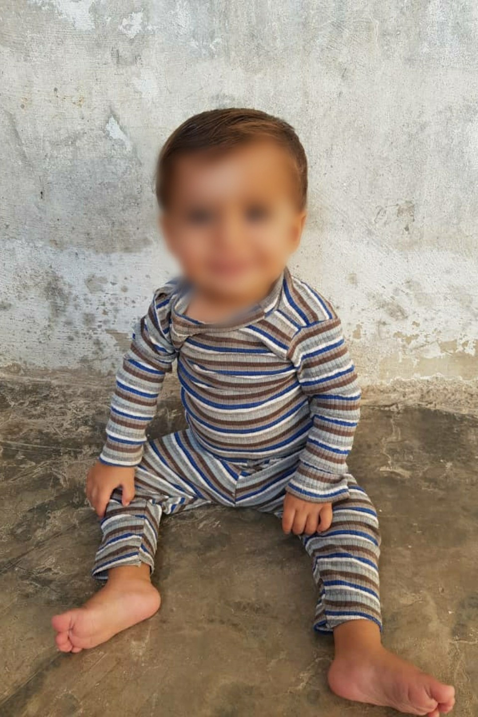 An orphan child needs hearing aids