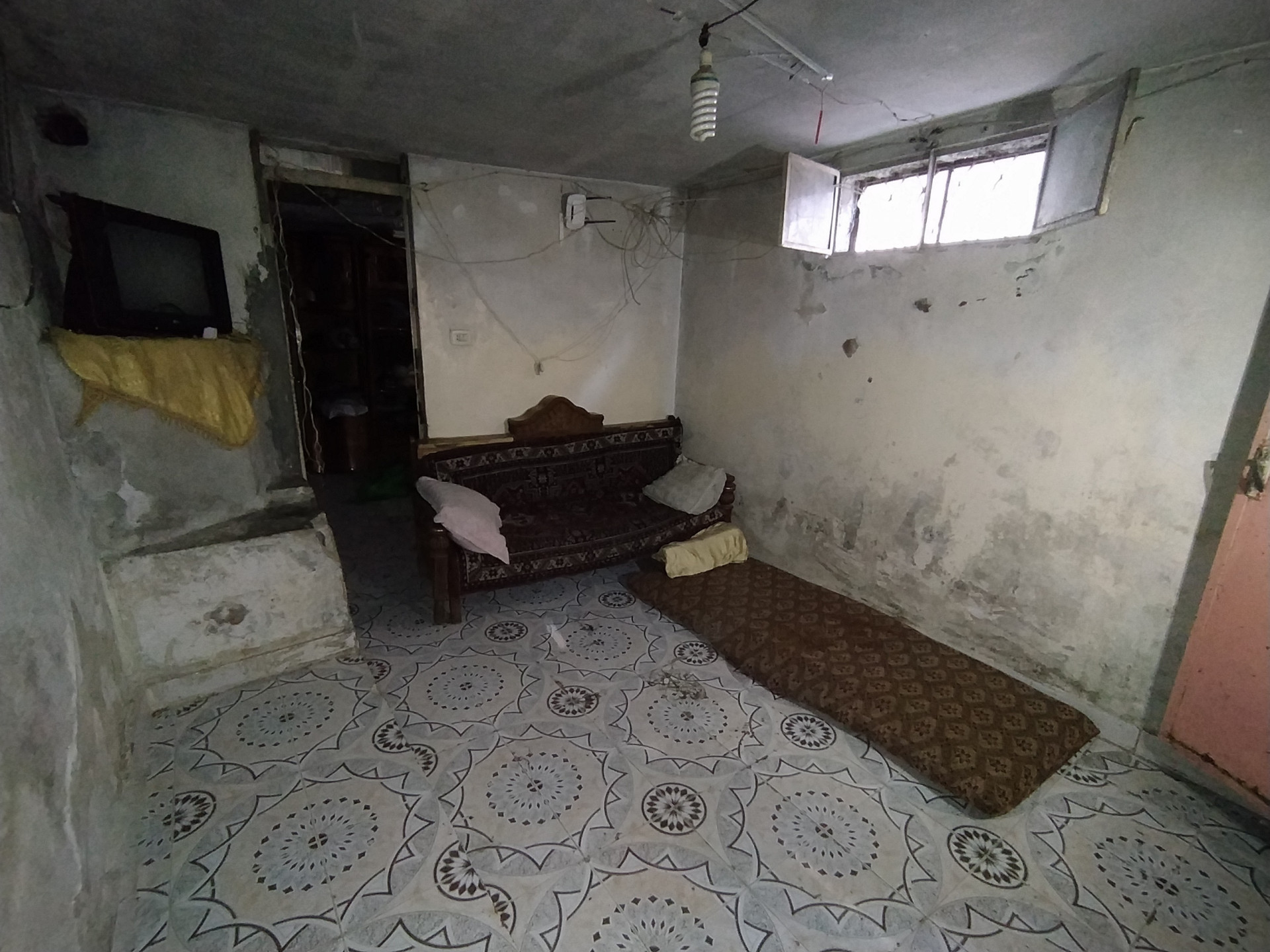 A family in miserable living conditions