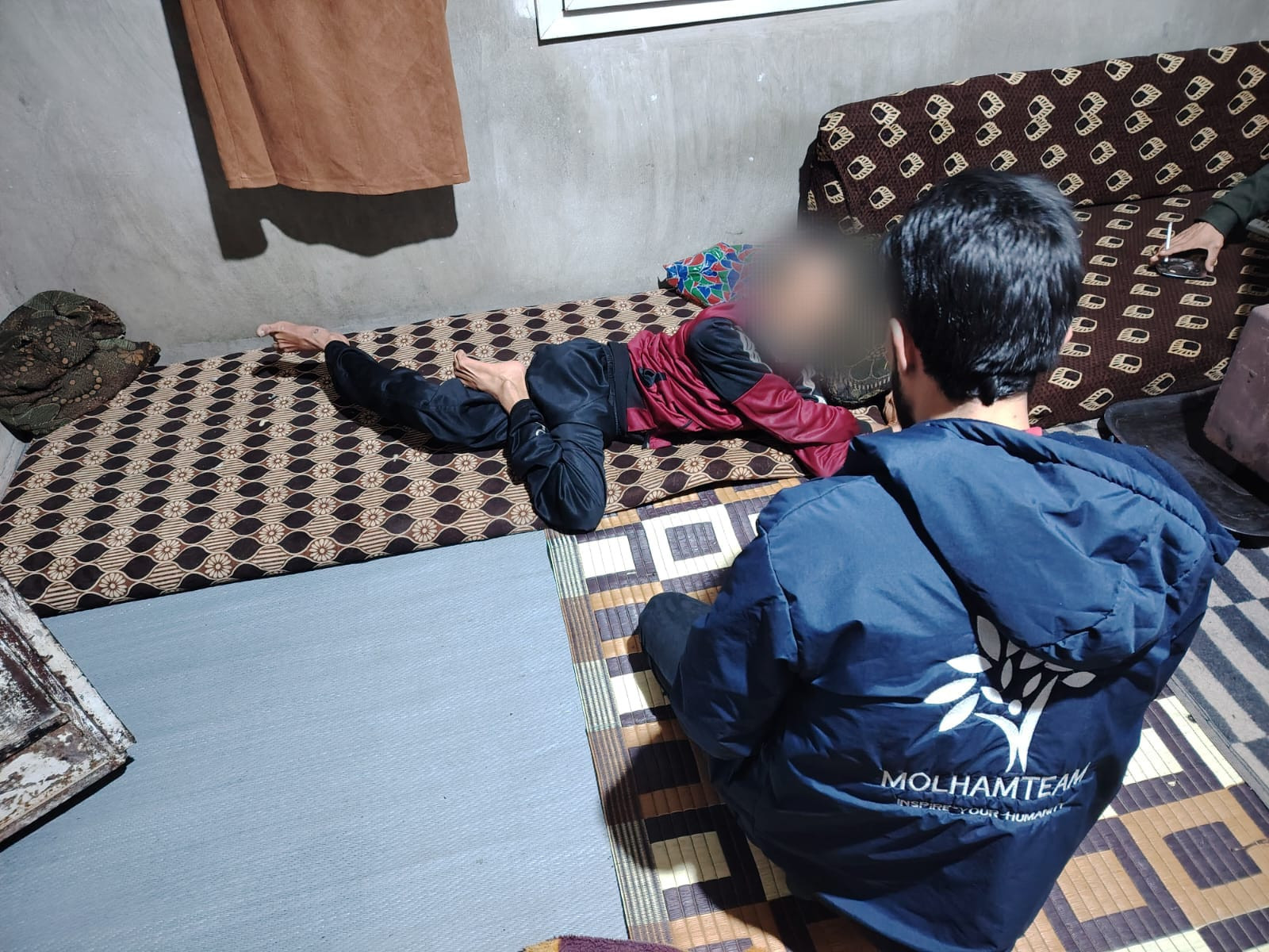 Quadriplegia has incapacitated Mahmoud, relegating him to a bedridden state.