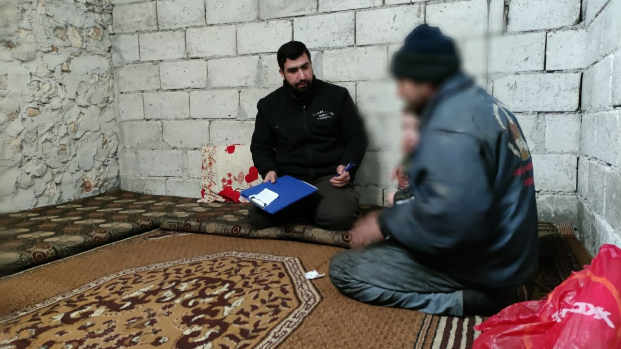 A family lives with no lights or furniture