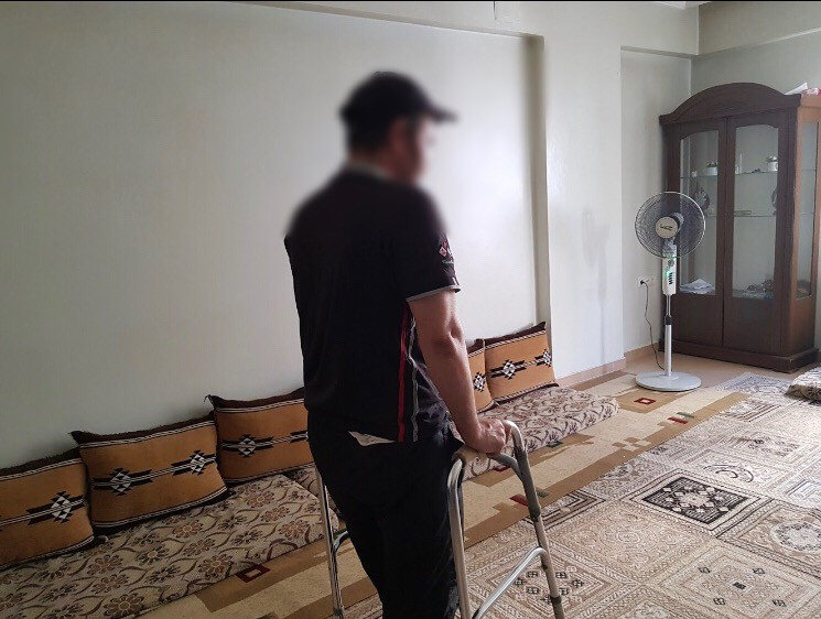 An injured man needs a wheeled chair