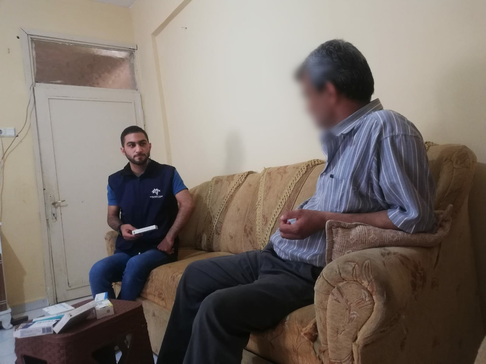 A little boy works hard to secure his father's medication