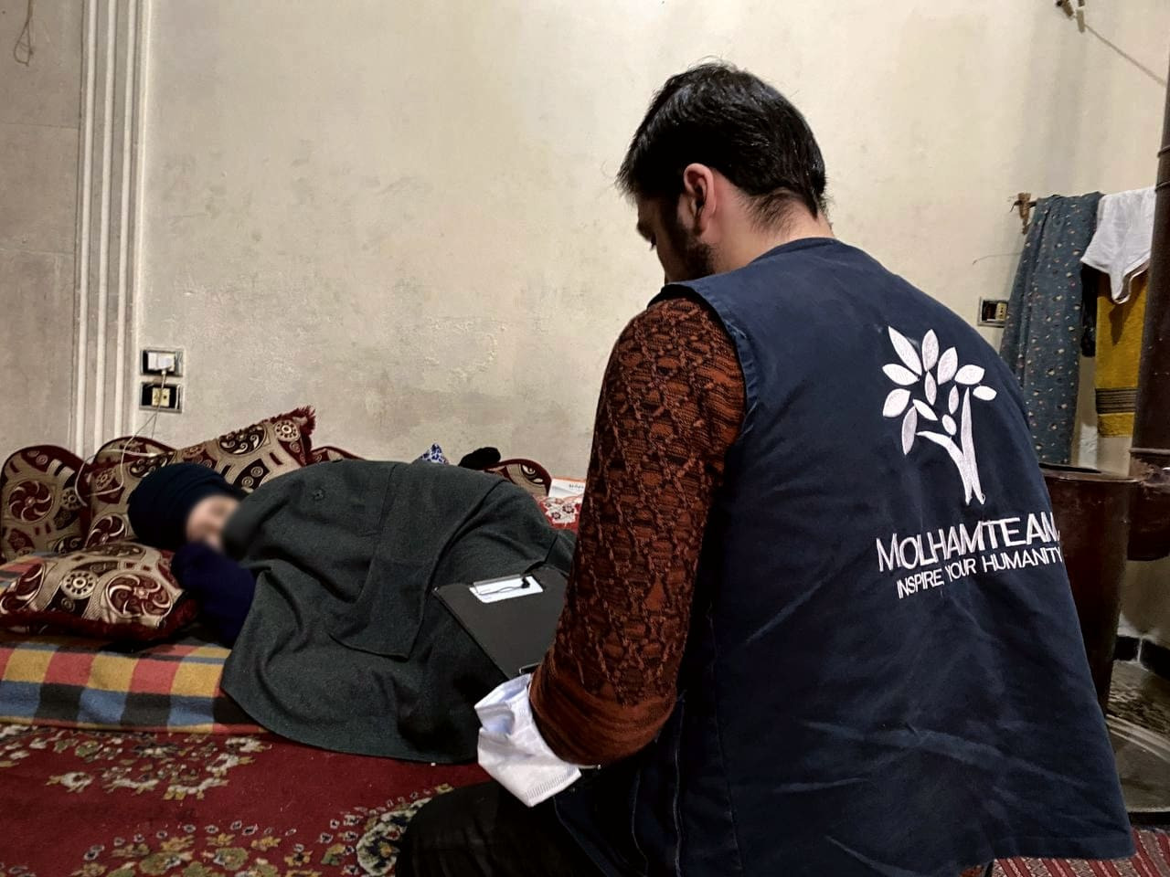 Riham has a vertebral fracture, which rendered her immobile and incapable of taking care of her child