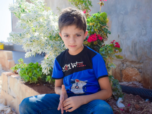 Louay is a child orphaned by the earthquake.
