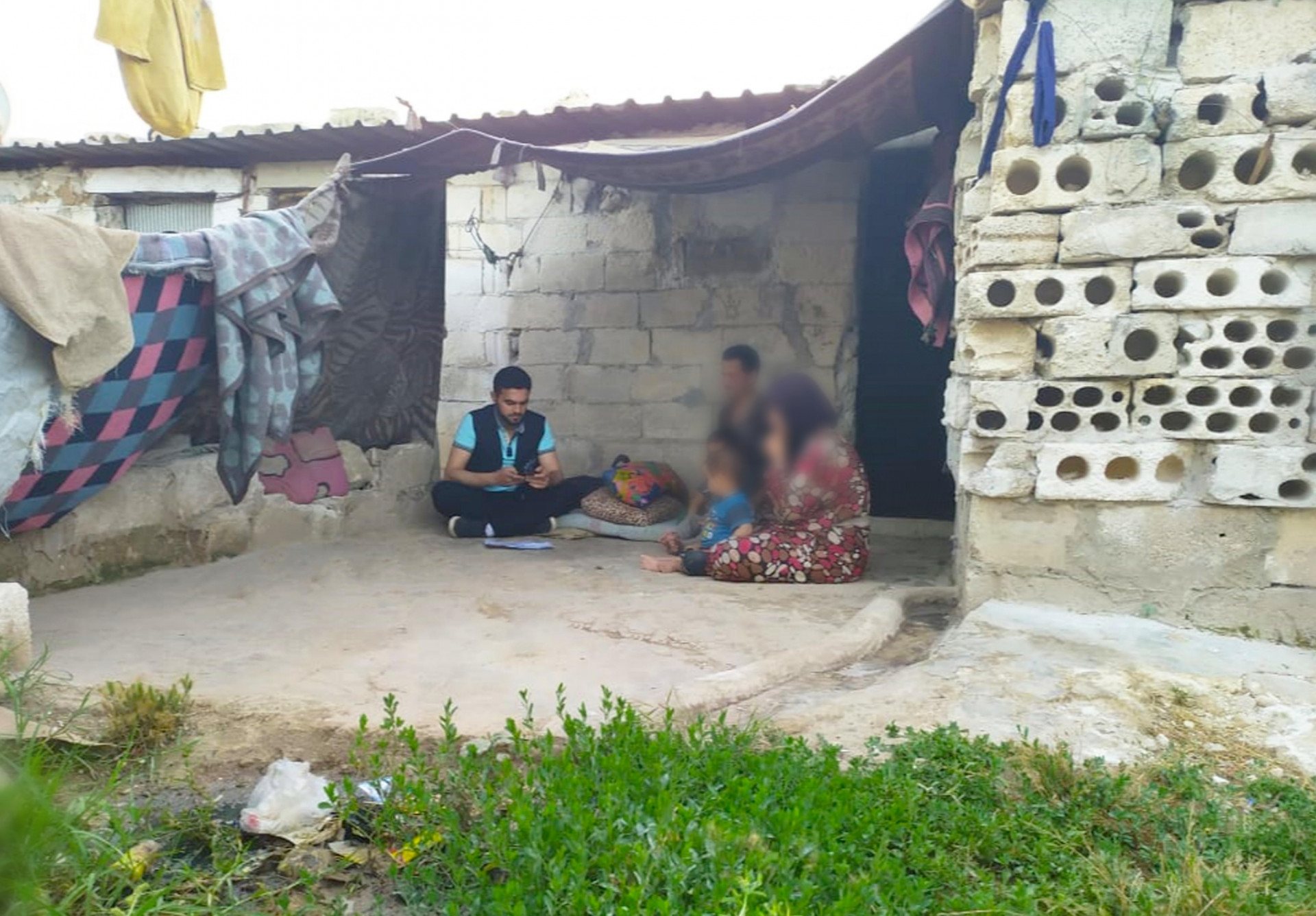 Ahmad is a blind displaced man with a sick wife and disabled son