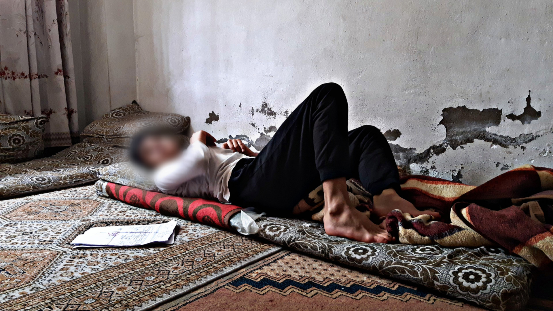 A displaced family with two children of special needs.