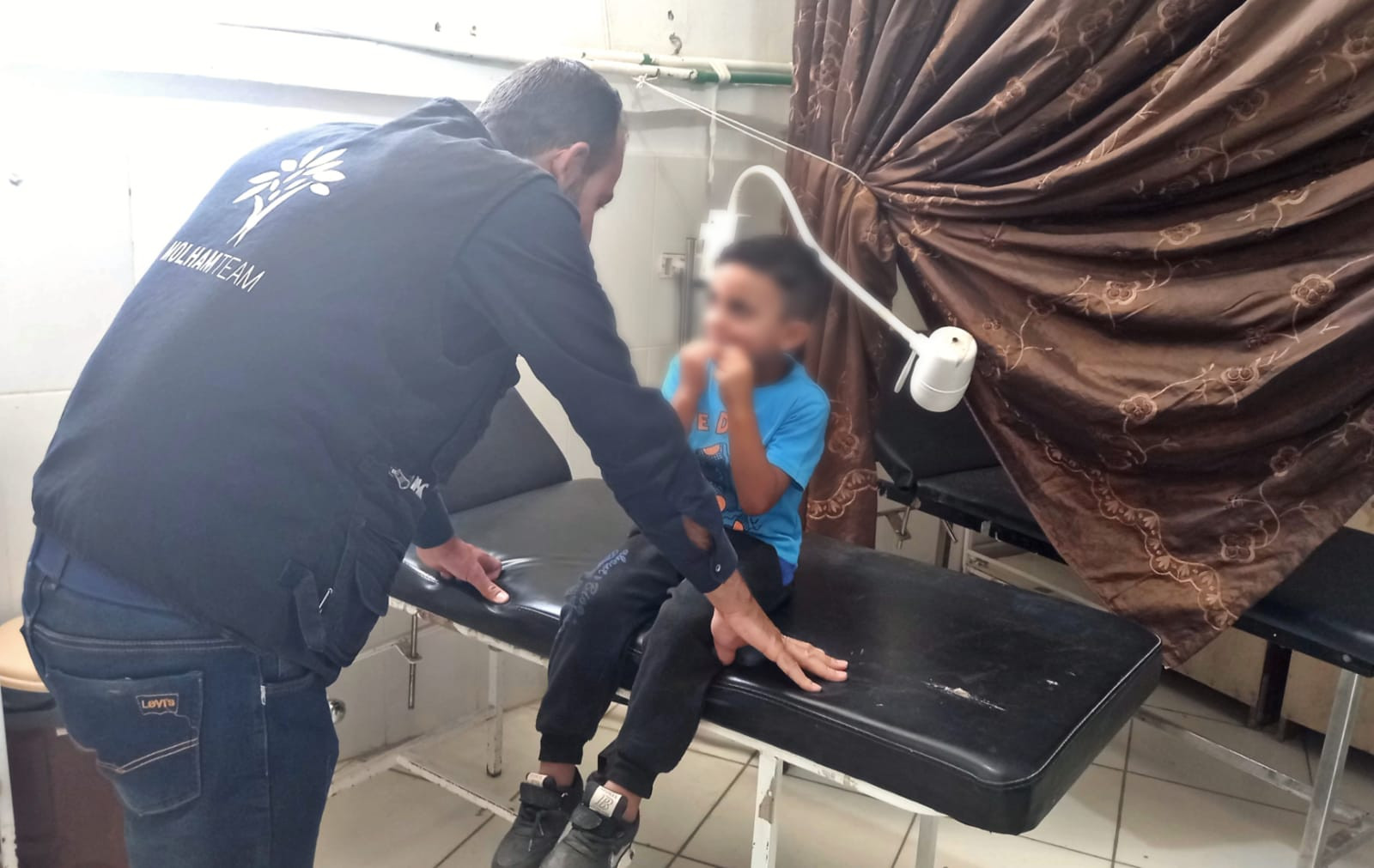 An orphan of both parents is supported by his aunt, has a testicular hernia and needs an operation
