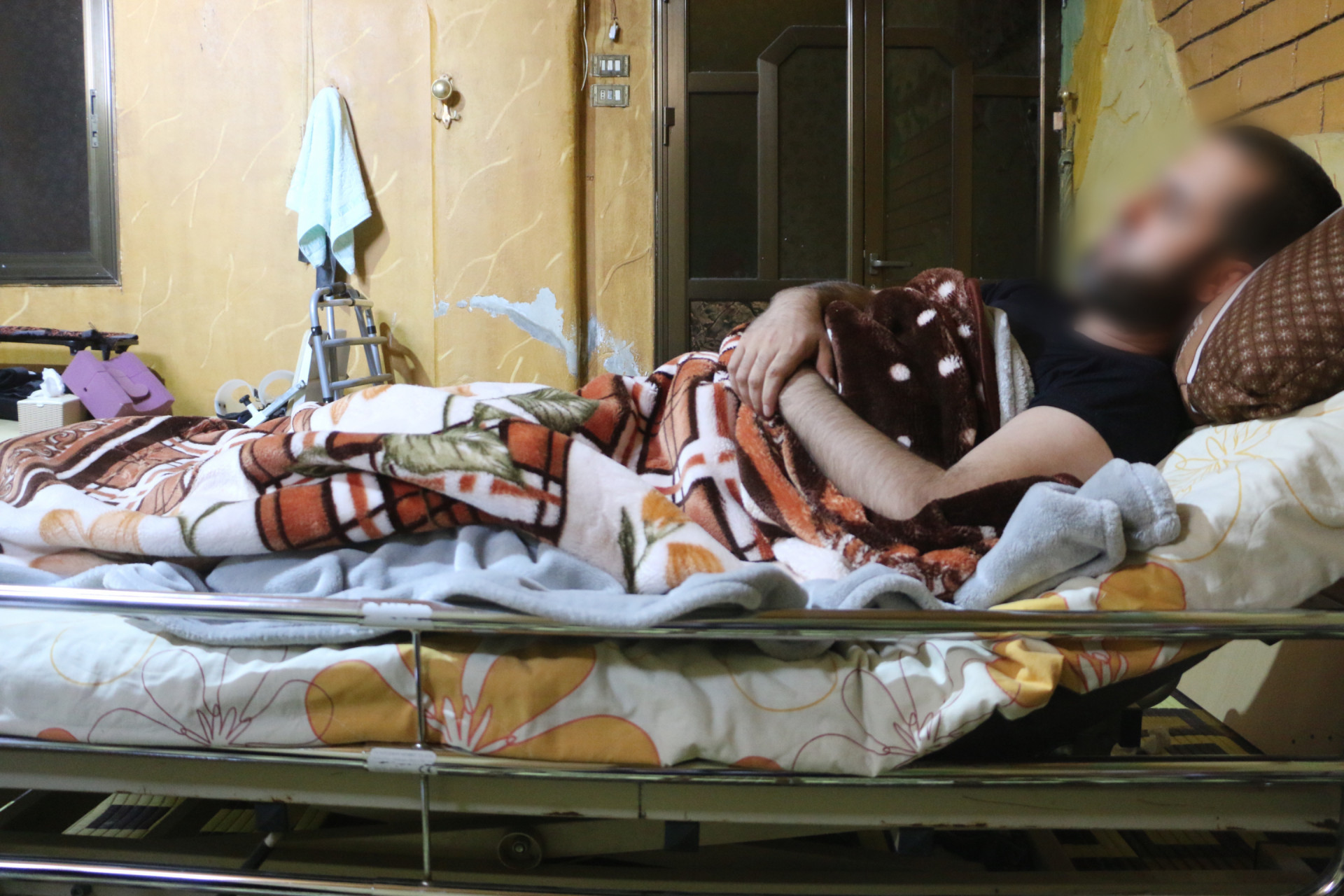 The earthquake turned Ahmed's life upside down, leaving him bedridden.