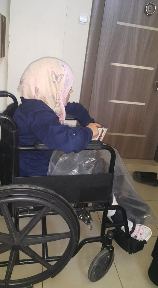Injured woman needing a wheelchair