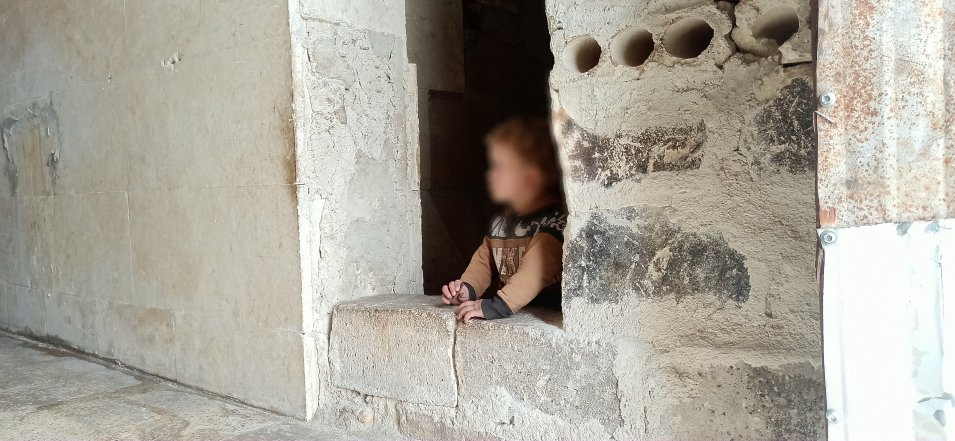 Asa'ad's family lives in an abundant house that lacks basic living needs.