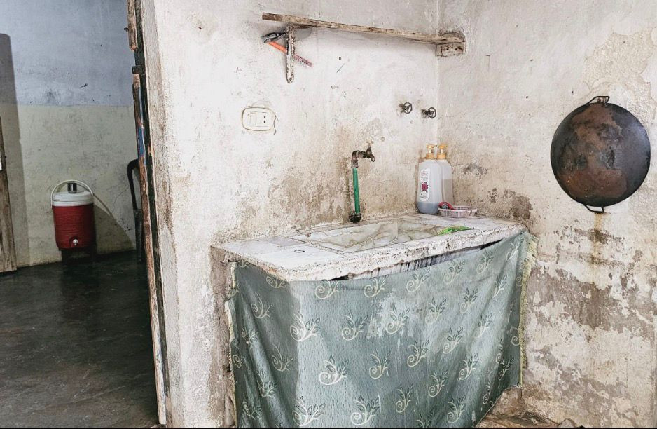 Earthquake-Damaged House, Bombed Home, Heavy Debts