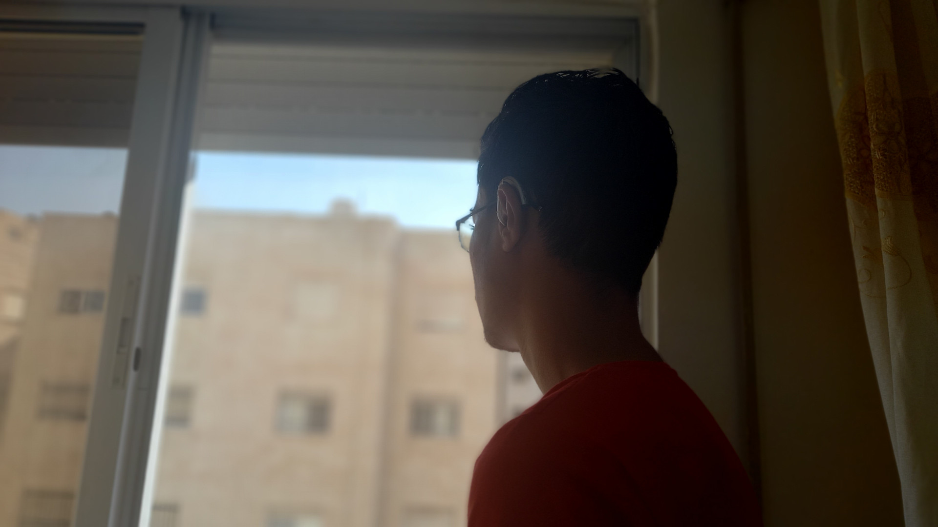 Fadi suffers from hearing loss and needs hearing aids