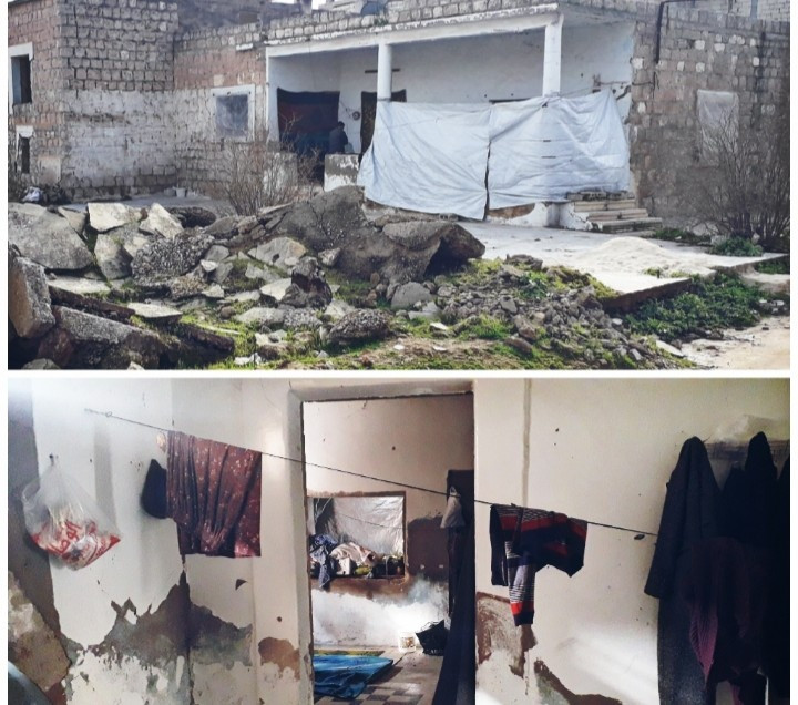 A family living in a ruined house