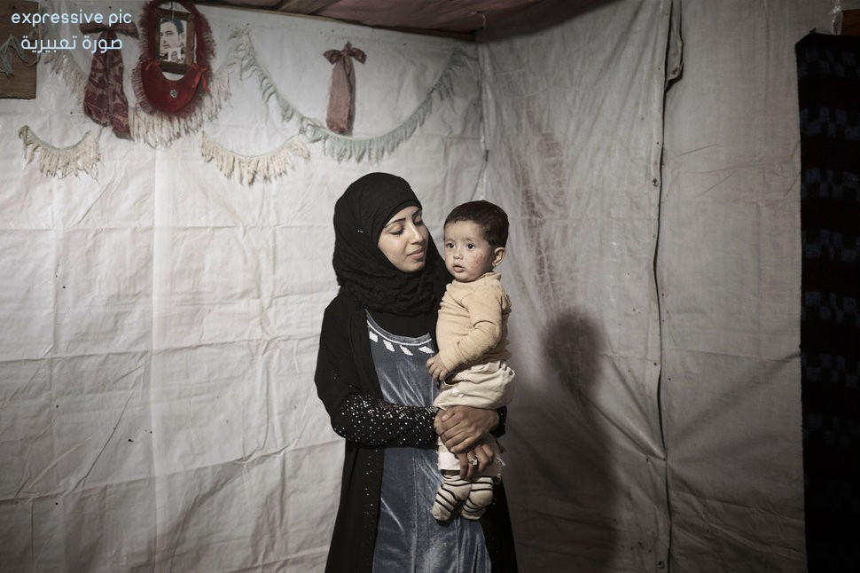 A mother and her child needing treatment expenses