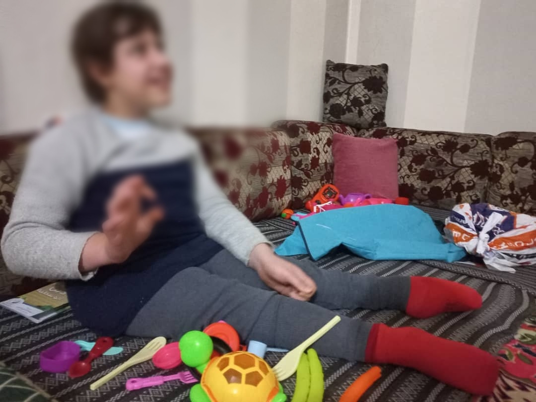 Mayada is with paralyzed extremities, needs electric wheelchair and medications.