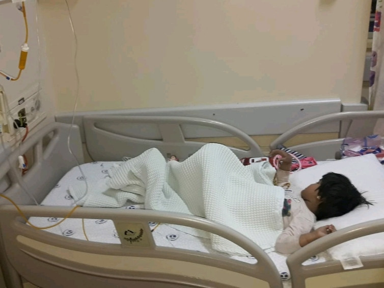 A sick girl lives in poor conditions