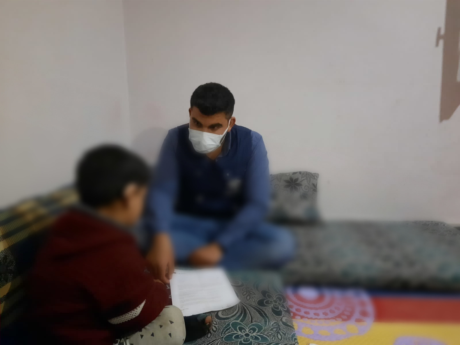 Child Hudhaifa suffering from the inability to hear and need your help