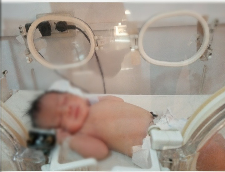 A fee weeks old baby needs an incubator to save his life.