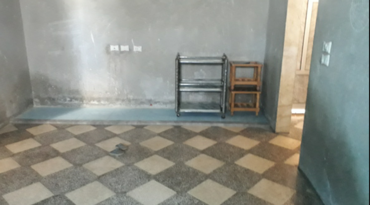 A displaced family living in a poor house