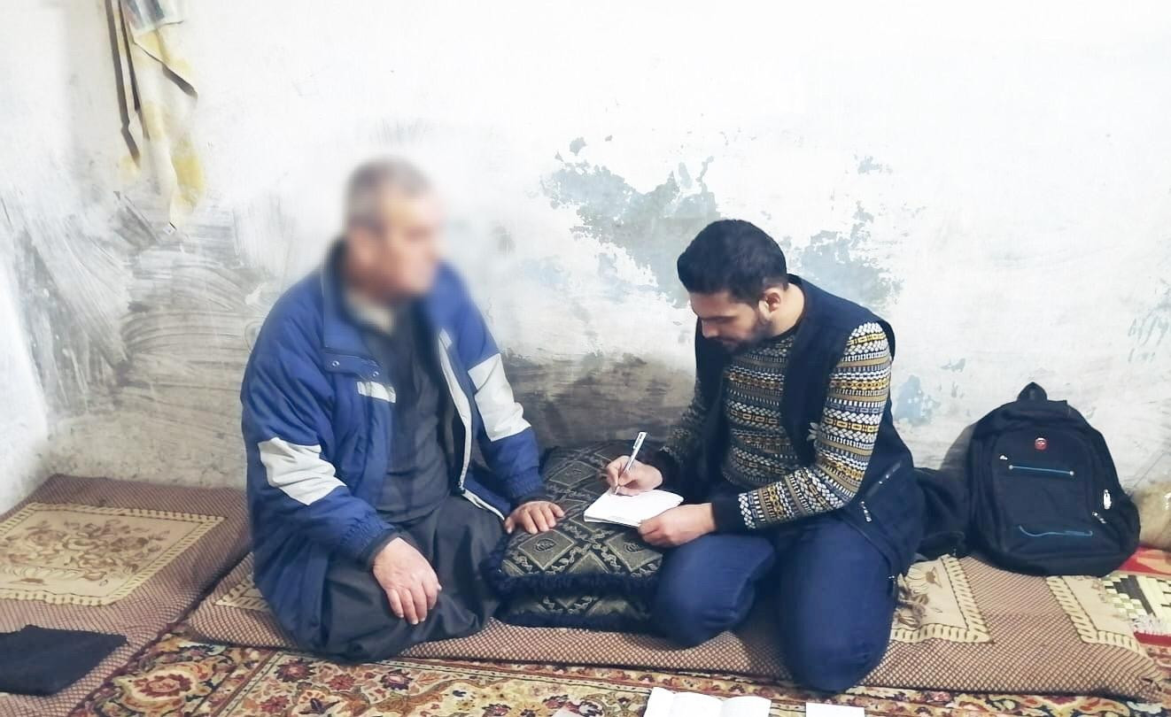 An elderly man with hearing deficiency