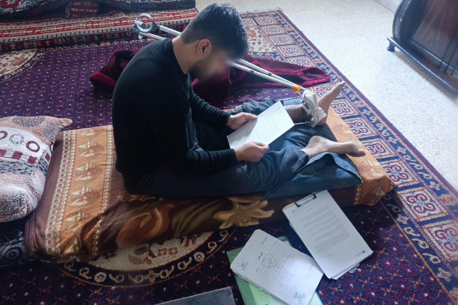 Ahmed struggles with his pain and poorness.