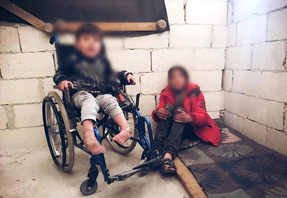 A little boy got disability due to bombardment, needs a wheelchair