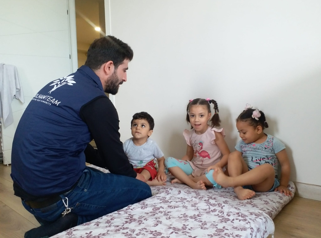 A small house is housing three families who miraculously survived the earthquake.