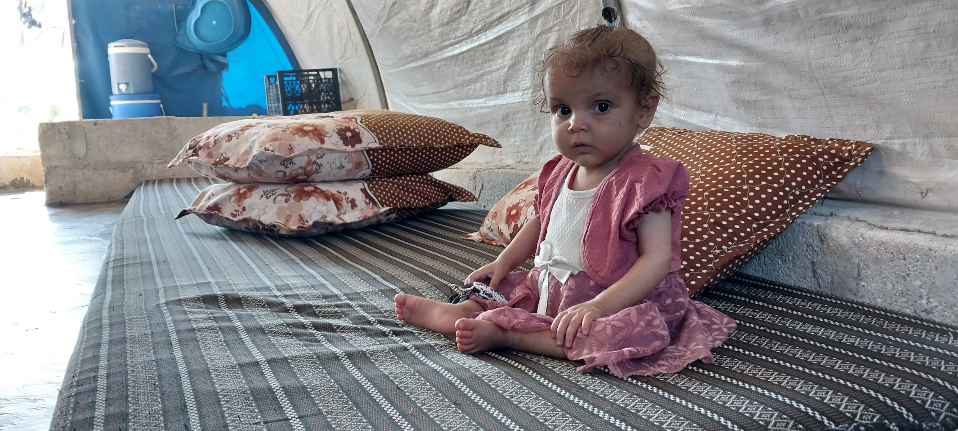 Qamar is dealing with a heart defect, growth failure, and poor absorption, all of which are significant health challenges.