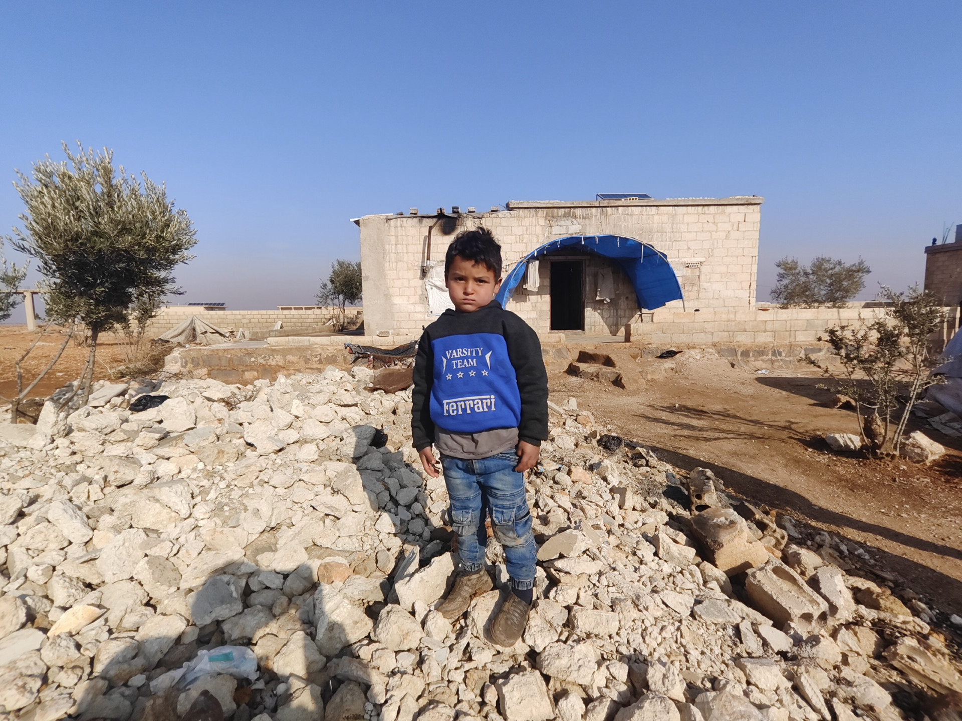 a destroyed house and an ill child!